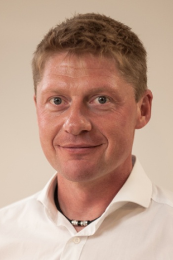 Hr. Tom Heinicker